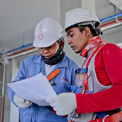 people working in hard hats