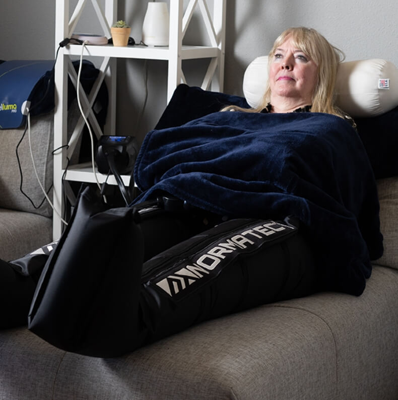 woman wrapped in Normatech wrap