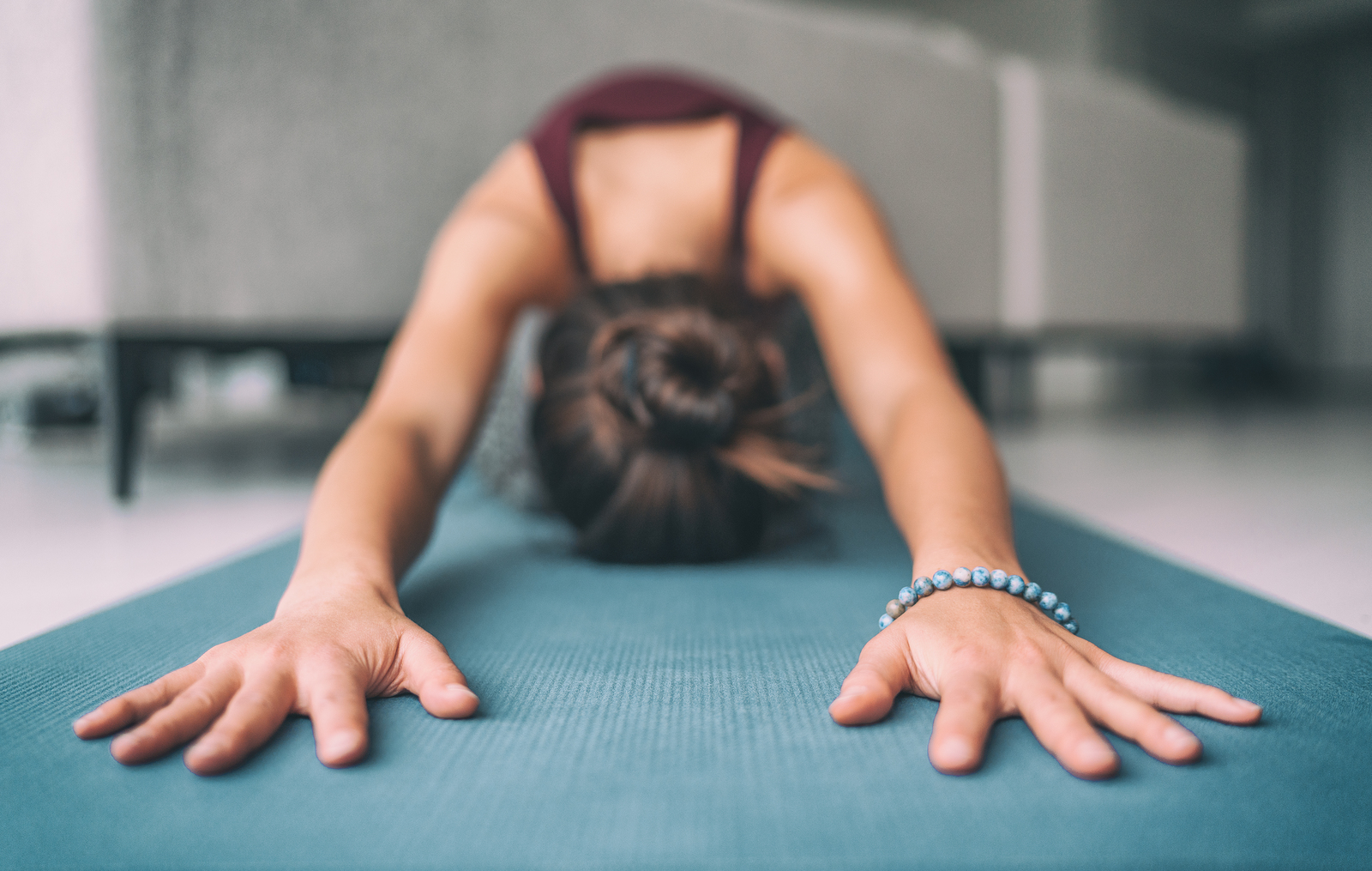 Yoga home stretching meditation woman doing childs pose warm up