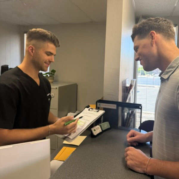 Patient checking in at reception