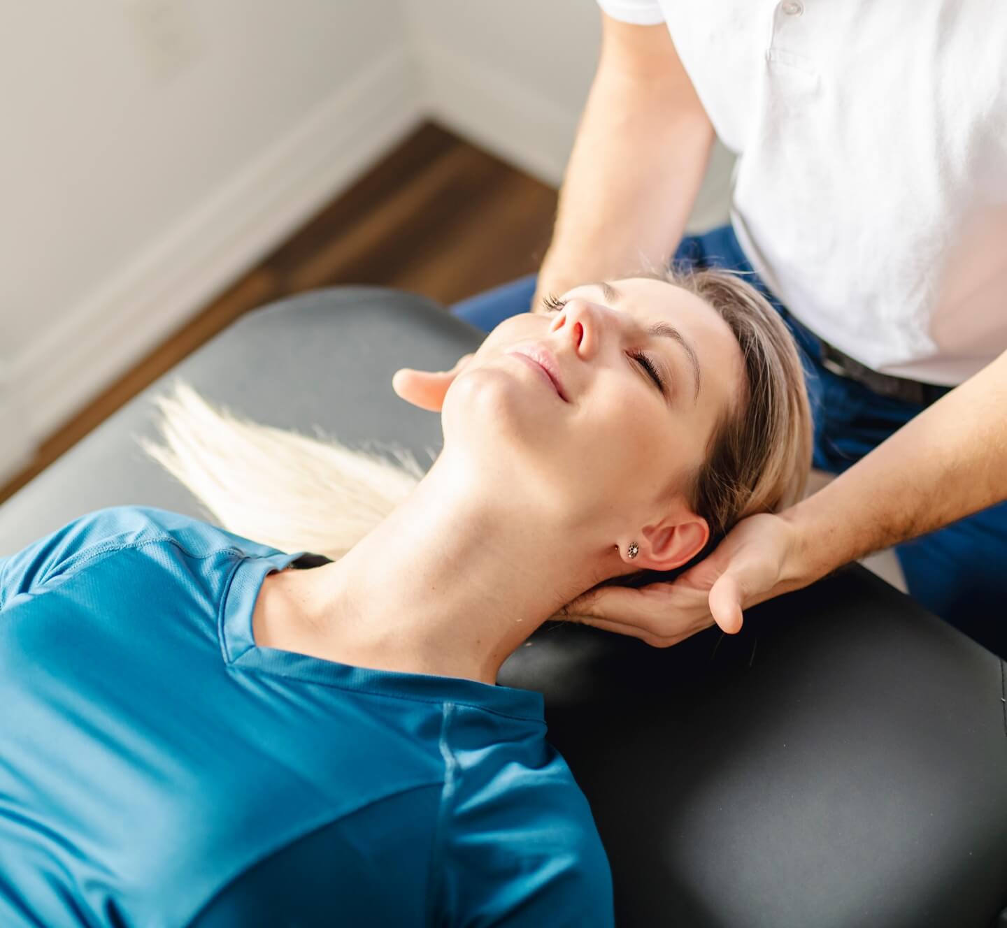 Female patient relaxed neck adjustment