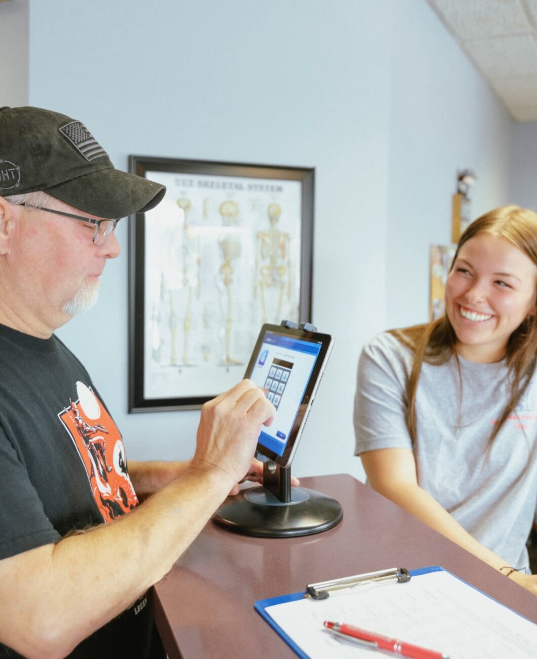 Patient checking in at reception