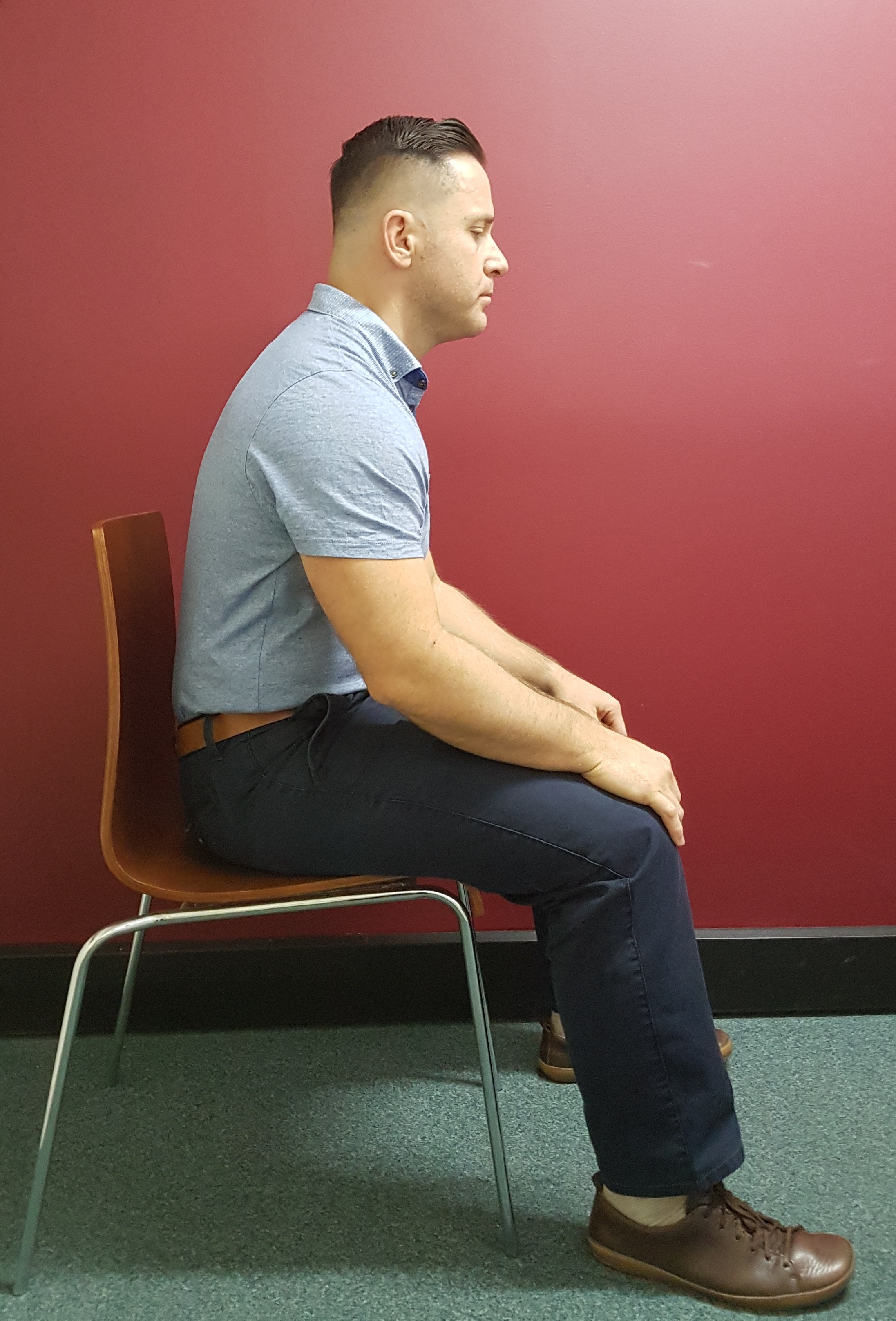 Dr B Sitting with Bad Posture