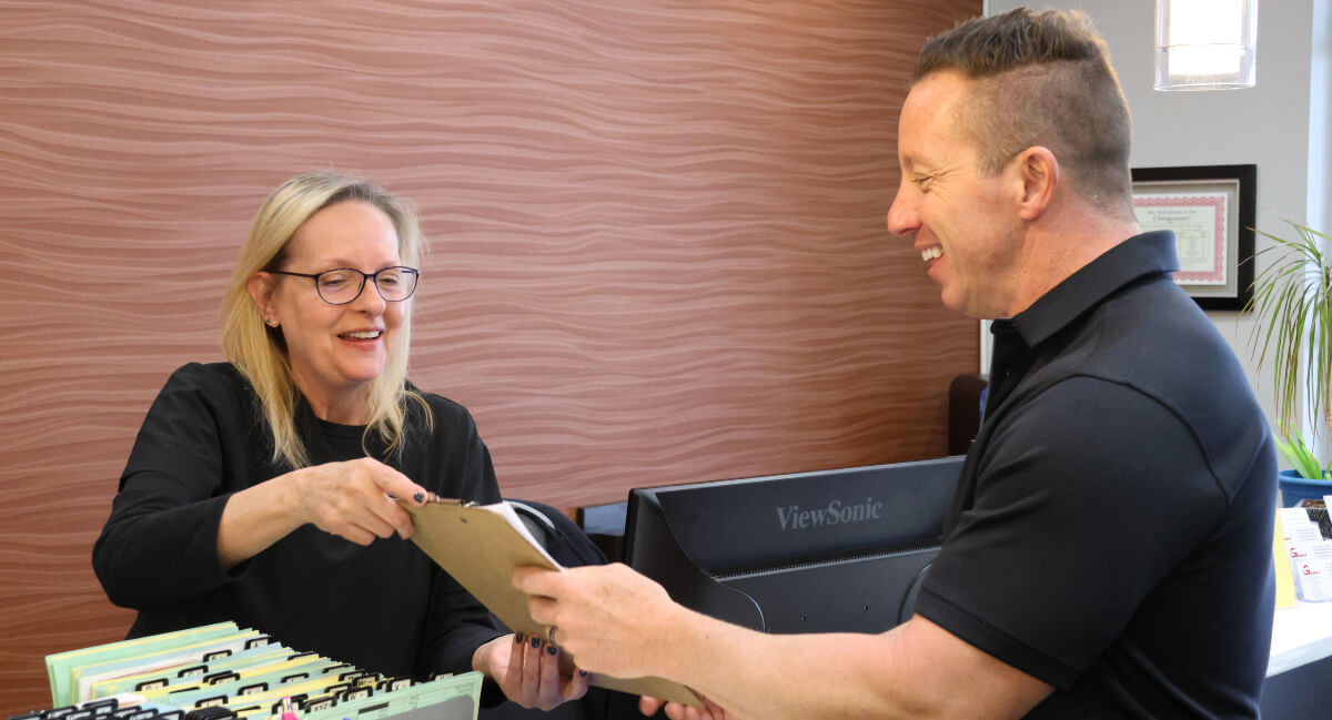 Columbus patient checking in at Graceland Chiropractic