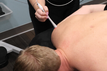 Close up view of laser therapy used to treat Columbus patient's arm