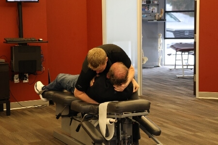 Chiropractic cross-body adjustment