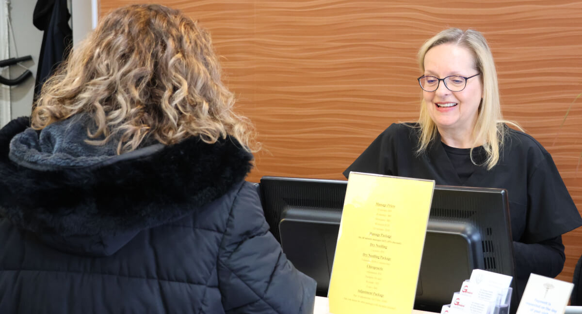 Patient filling out workers compensation intake forms