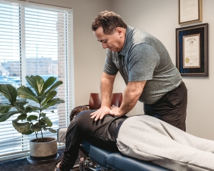Upper-back adjustment used on female patient