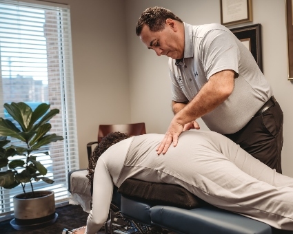 Chiropractic treatment used on pregnant patient's back
