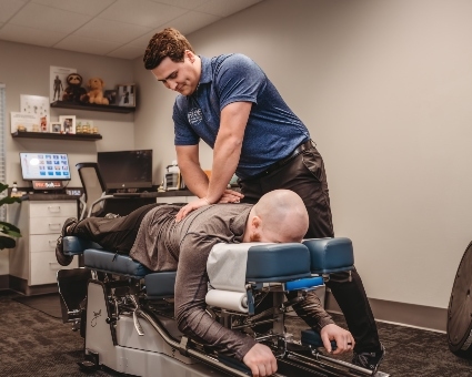 Lower-back adjustment used on male patient
