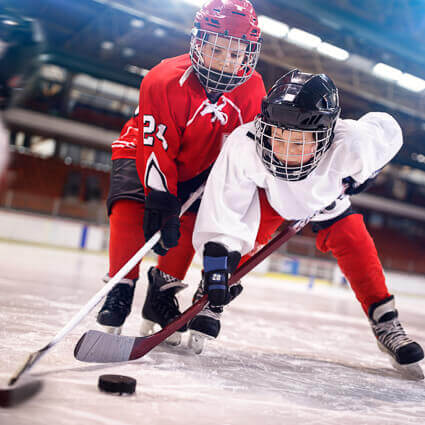 kids-hockey-duel-over-puck-sq
