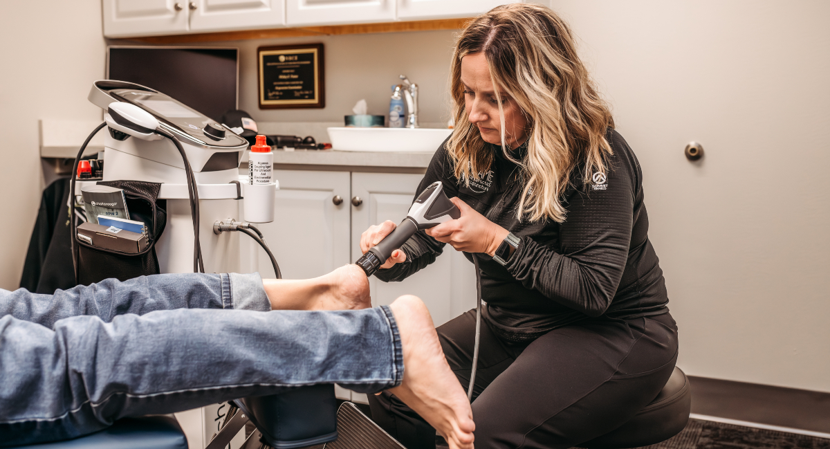Radial Pressure Wave Therapy used to treat patient's foot