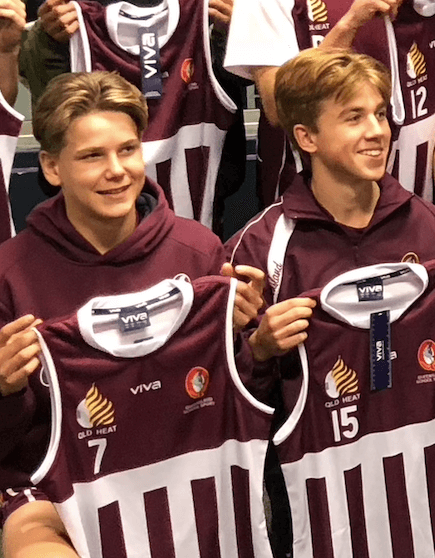 A young Will Ashcroft and Dan Lanthois receiving their U15 AFL Schoolboys Qld jumpers