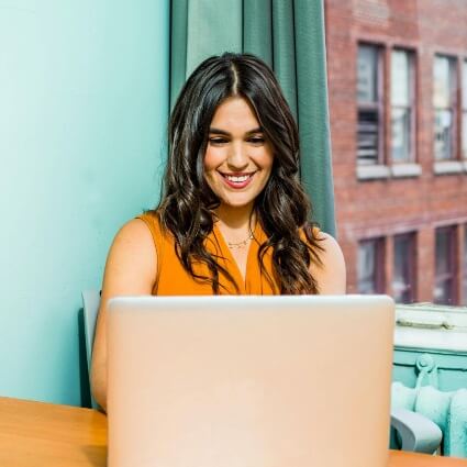 person working at their laptop