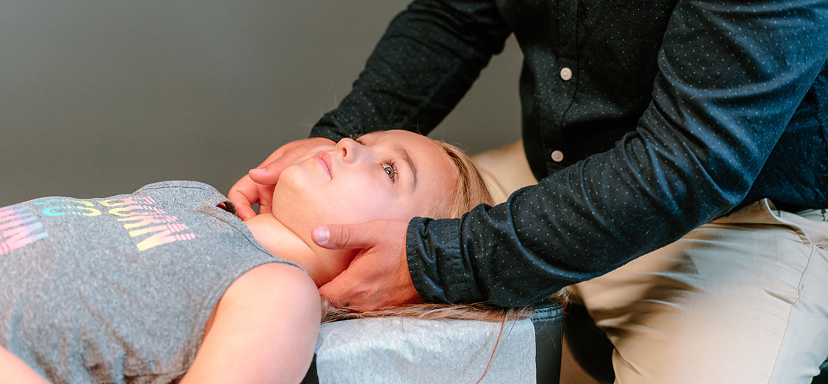 Child getting neck adjusted