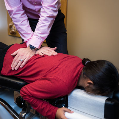 Dr. Nafziger performing a lower back adjustment