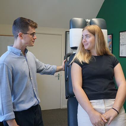 Dr Max speaking with patient