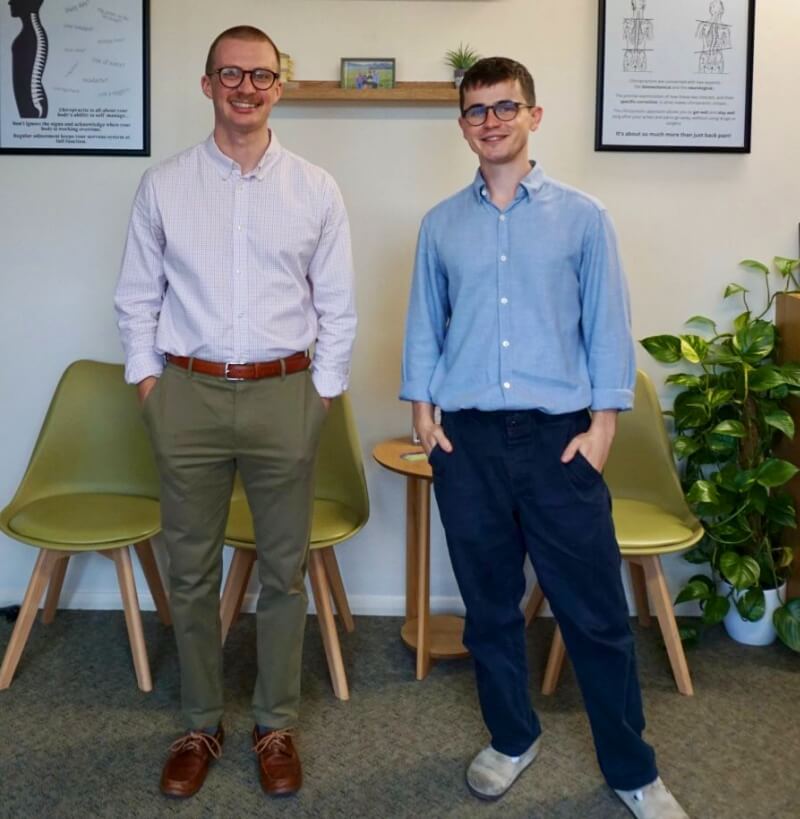 Chiropractor adjusting patient