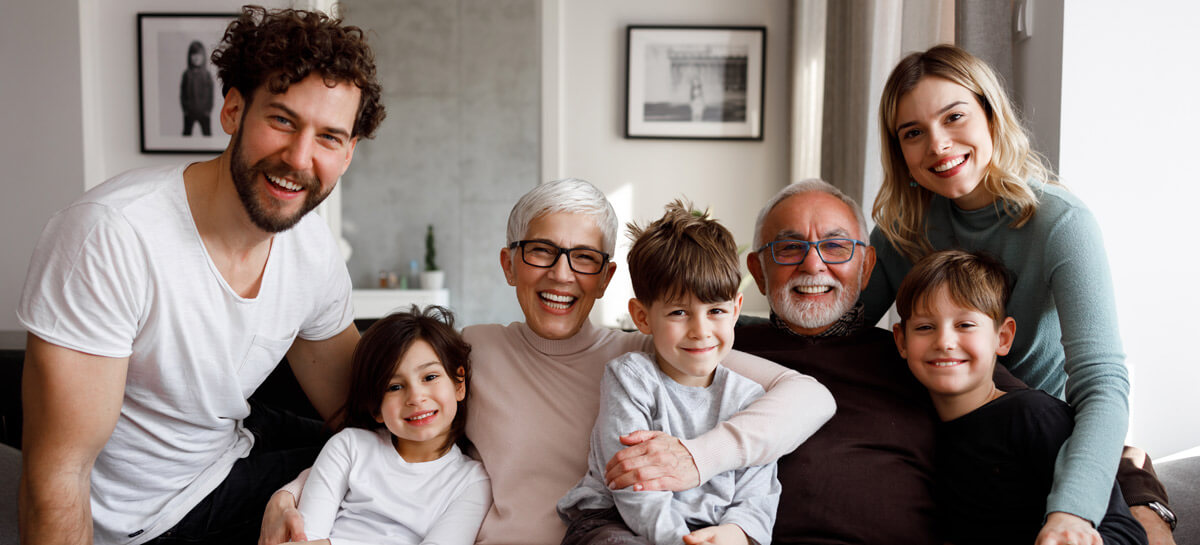 family sitting on couch