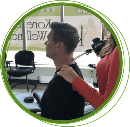 Chiropractic patient receiving treatment on his neck