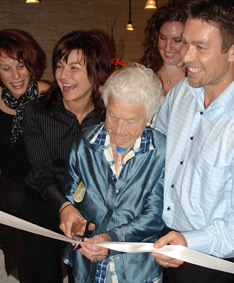 Owners, Dr. Nancy & Mark join Mississauga Mayor Hazel McCallion as she cuts the ribbon at the official Grand Opening celebration of Kore~Energy Chiropractic.