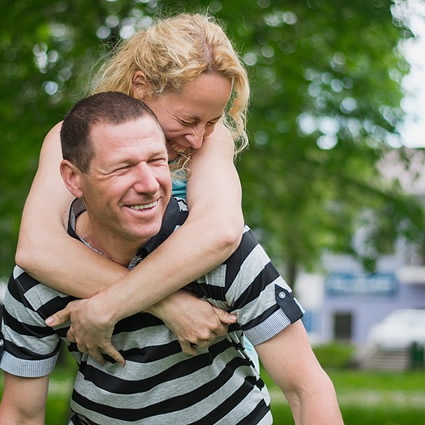 Adult couple piggyback