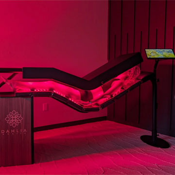 patient in red light therapy bed