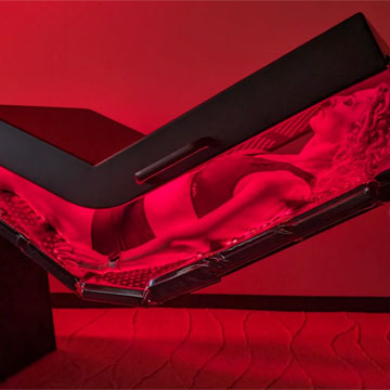 woman in red light therapy bed
