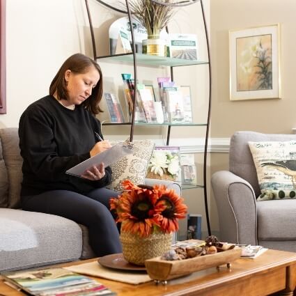 patient filling out forms in our waiting area