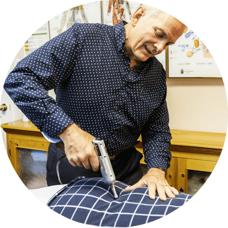 chiropractor adjusting patient