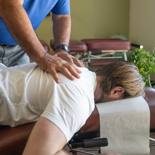 Back adjustment performed by chiropractor