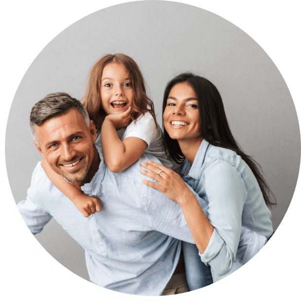 family of three smiling