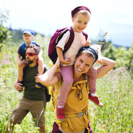 happy family hiking outdoors