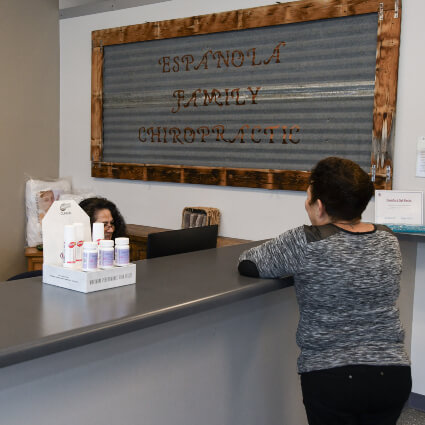 Espanola Family Chiropractic front desk checking in