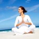 yoga-woman-on-beach
