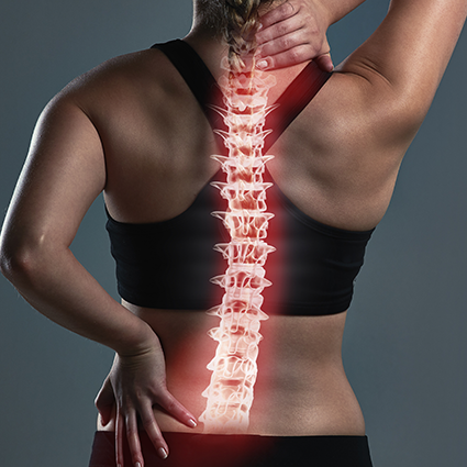 person with illustration of spine over their back