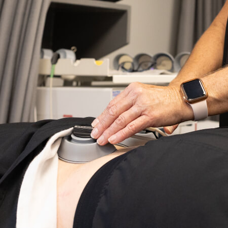 E-stim used on patient's back