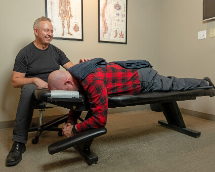 patient on adjusting table