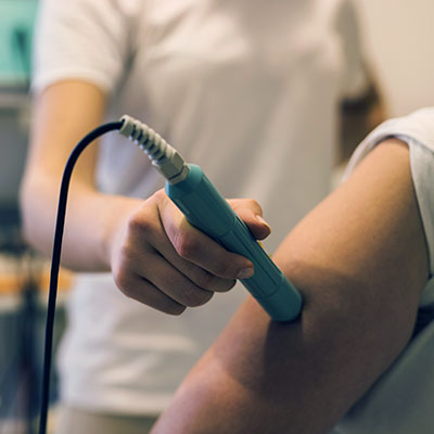 softwave therapy on a patients arm