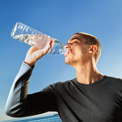 man drinking water