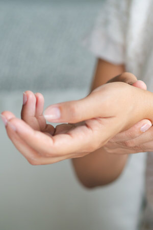 closeup of hand holding wrist