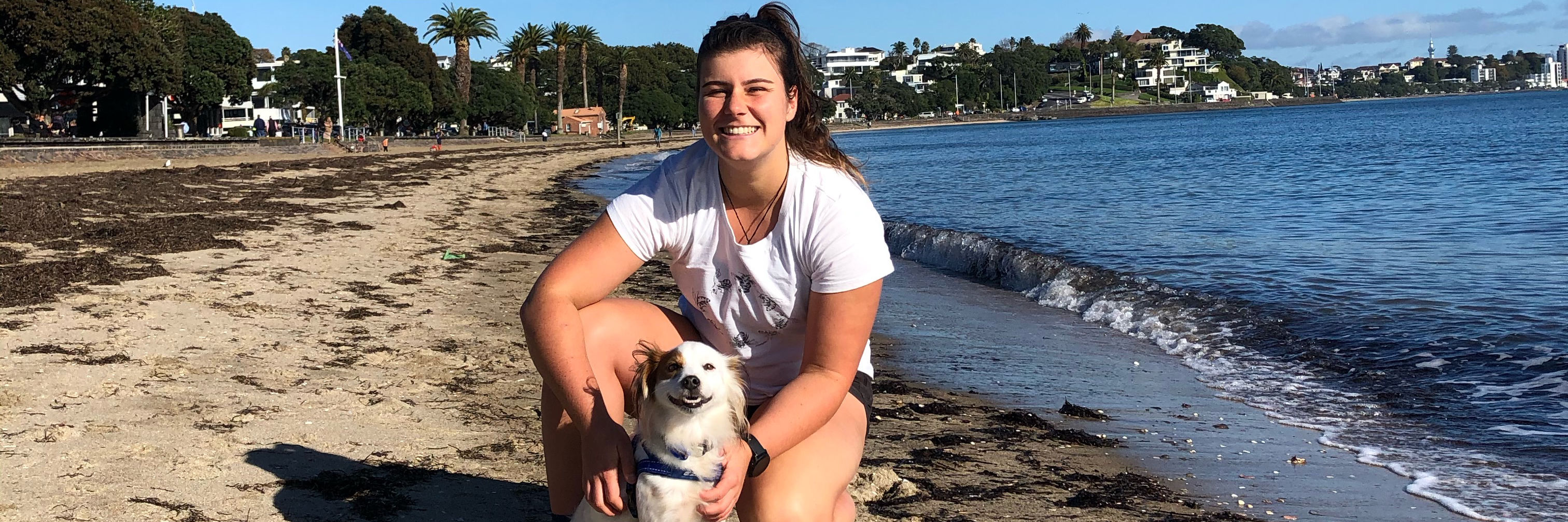 Rachael with her dog at the beach