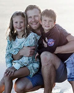 Dr Chris Anderson with his kids