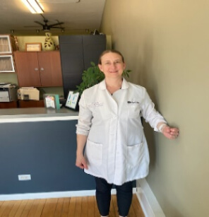 chiropractor demonstrating shoulder excercise 4