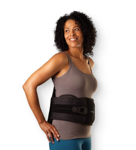 Lady wearing a back brace