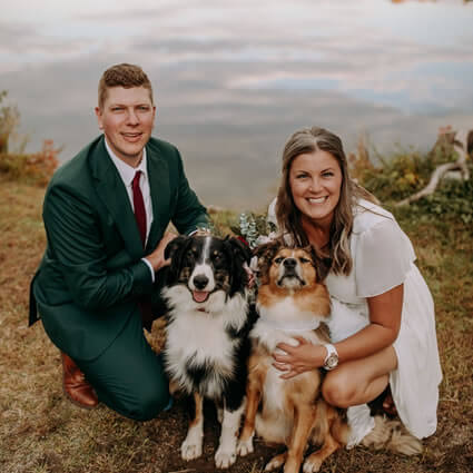 Dr. Scott and his wife and dogs at their wedding