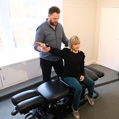 Hungerford-Physiotherapist-Andrew-Working-On-Patient.