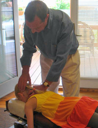 During a regular visit, Dr. VanDehey is shown here adjusting one of his practice members. reguar adjustment
