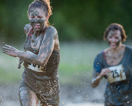 Women running mud