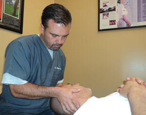 Dr. Silecchio adjusting a patient.